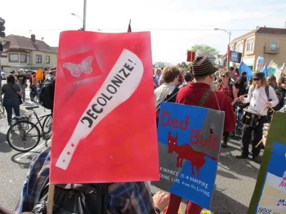 Protest May Day oakland machete decolonialize