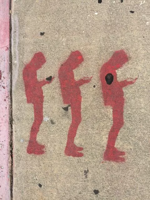 CA LA Highland Park cellphone gazing