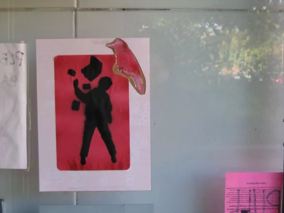 MN figure with arm raised