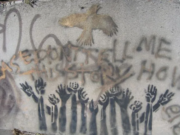 NC Asheville hands raised and bird